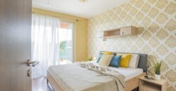 Prodej bytu 2+kk 53,2m2 se zahrádkou a garážovým stáním