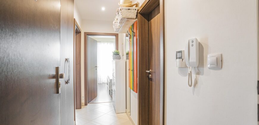 Prodej bytu 2+kk 53,2m2 se zahrádkou a garážovým stáním