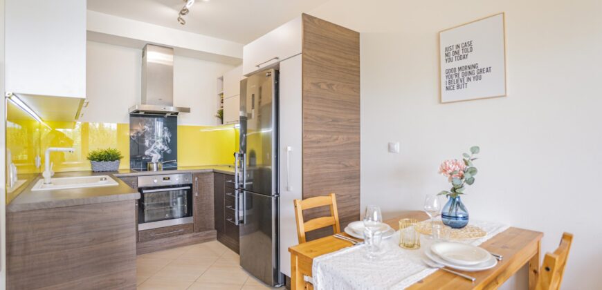 Prodej bytu 2+kk 53,2m2 se zahrádkou a garážovým stáním